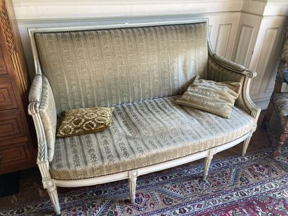 Molded and painted beech sofa with flat back...