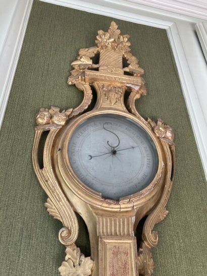 Carved and gilded wood barometer of violin...