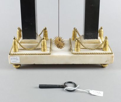 White marble, black marble and gilt bronze...