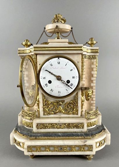White marble and gilt bronze clock representing...