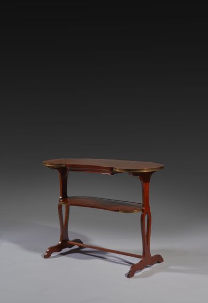 Mahogany writing table with two moving tops...