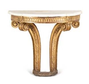 Half-moon shaped console in carved and gilded...