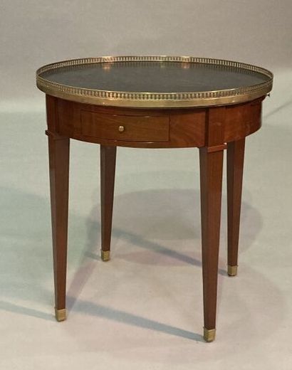 Mahogany bouillotte table of circular form,...