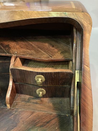 Walnut veneered sloping desk opening with...