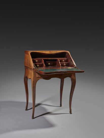 Walnut veneered sloping desk opening with...