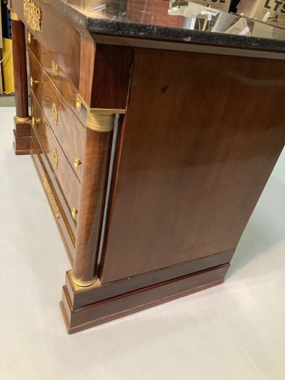 Flamed mahogany chest of drawers opening...
