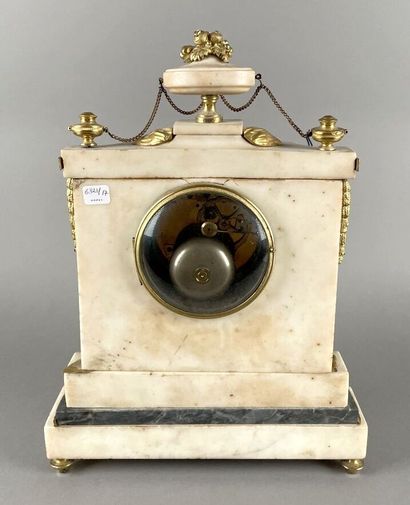 White marble and gilt bronze clock representing...