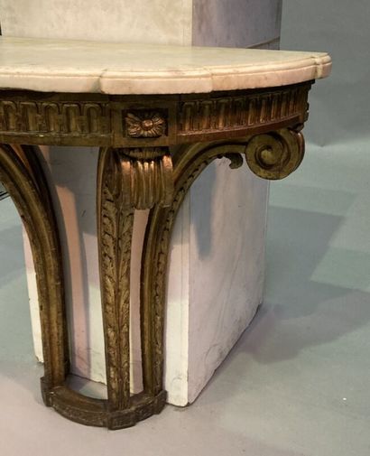 Half-moon shaped console in carved and gilded...