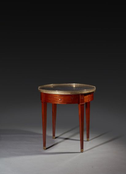 Mahogany bouillotte table of circular form,...