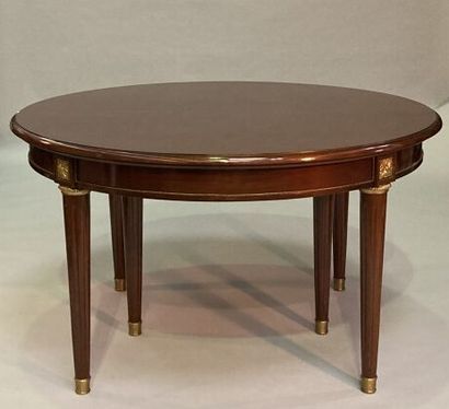 Mahogany dining room table of circular form,...