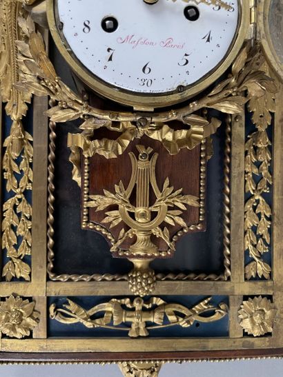 Cartel in gilt bronze, painted sheet metal...