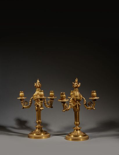 Pair of ormolu candelabras with three arms...
