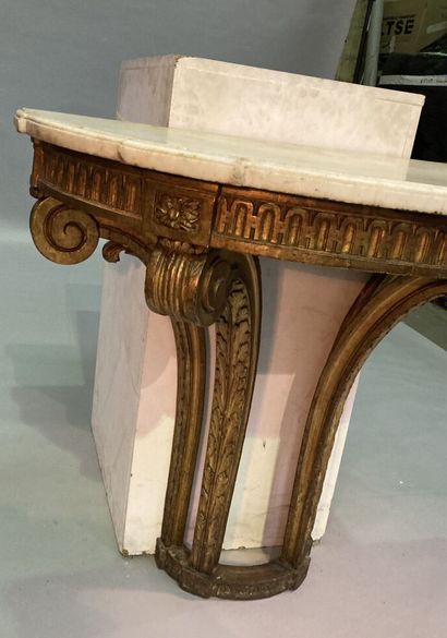 Half-moon shaped console in carved and gilded...