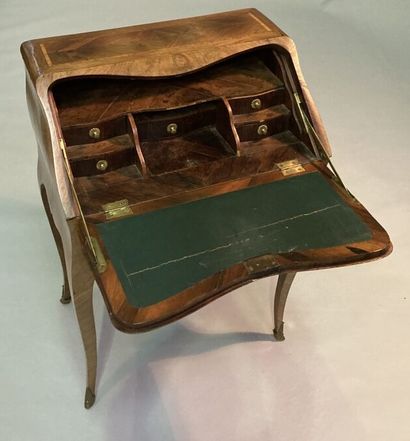 Walnut veneered sloping desk opening with...