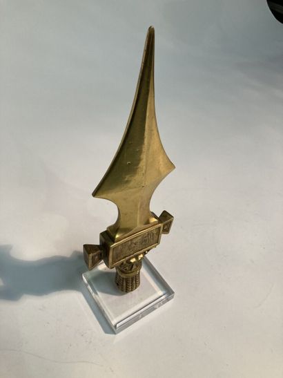 Flag point. 
In chased gilt bronze, with...