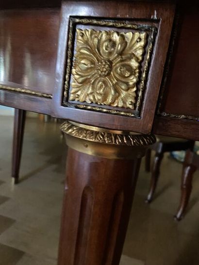 Mahogany dining room table of circular form,...