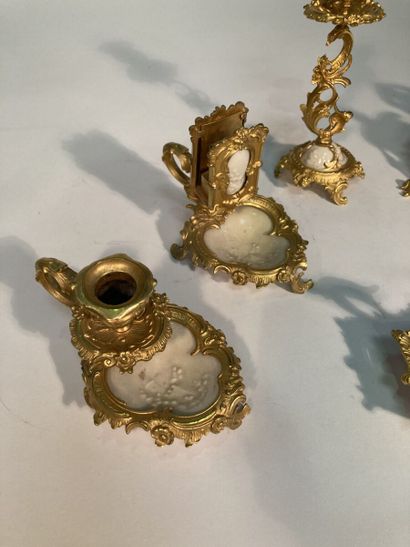 Porcelain desk set with gilt bronze mounting...