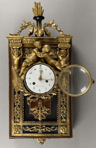 Cartel in gilt bronze, painted sheet metal...