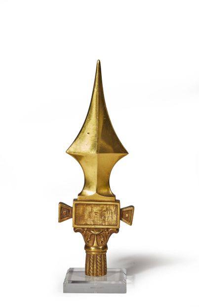 Flag point. 
In chased gilt bronze, with...