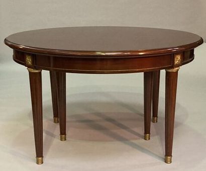 Mahogany dining room table of circular form,...