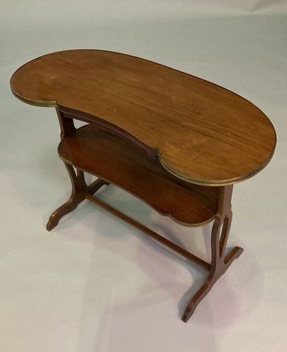 Mahogany writing table with two moving tops...