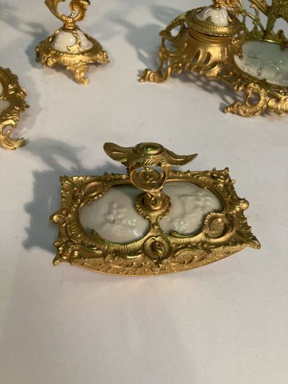 Porcelain desk set with gilt bronze mounting...