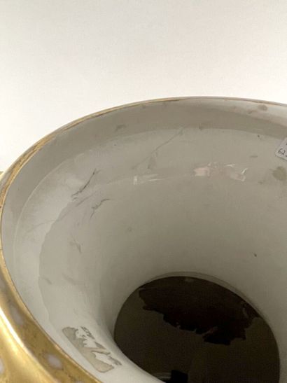 PARIS 
Large ovoid porcelain vase resting...