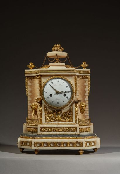 White marble and gilt bronze clock representing...