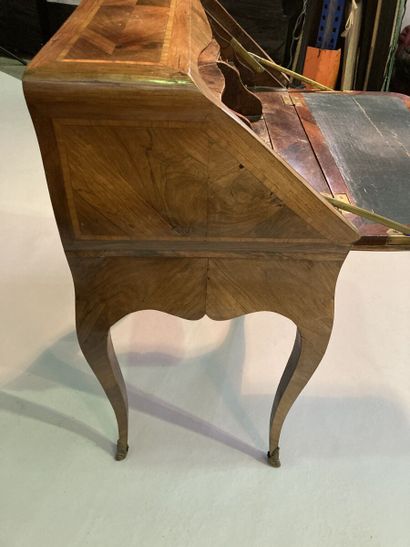 Walnut veneered sloping desk opening with...