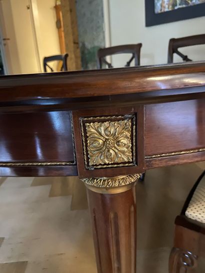 Mahogany dining room table of circular form,...