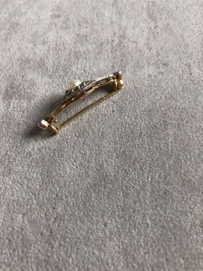 Broche en or jaune 750 millièmes et platine...