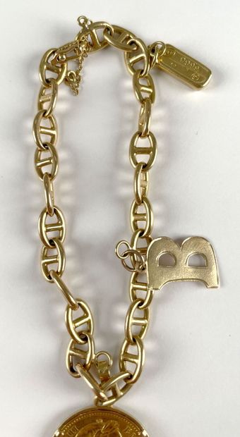 Bracelet articulé en or jaune 750 millièmes,...
