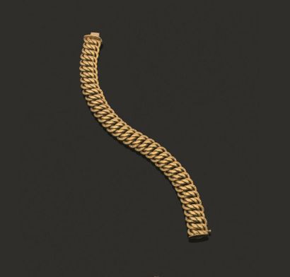 Bracelet articulé en or jaune 750 millièmes,...