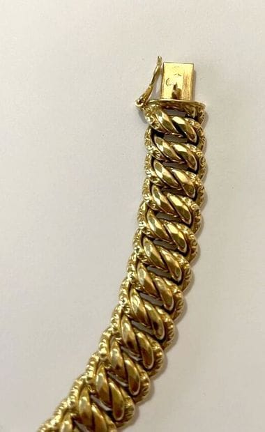 Bracelet articulé en or jaune 750 millièmes,...