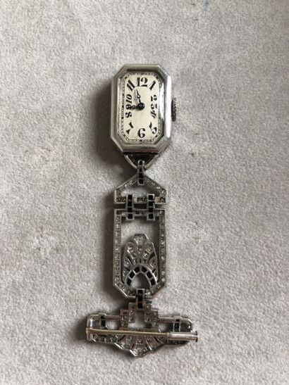 Broche en or gris 750 millièmes et platine...