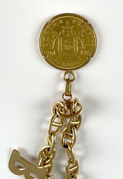 Bracelet articulé en or jaune 750 millièmes,...
