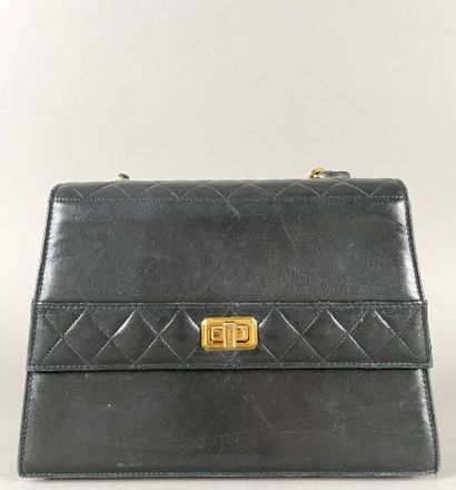 CHANEL, circa 1889-1990
Sac à main en cuir...