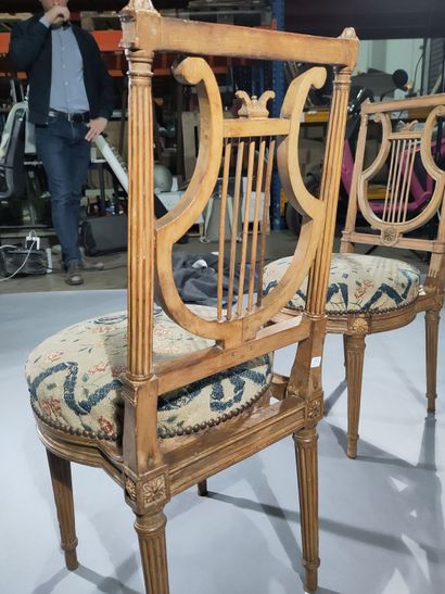 Pair of molded and carved beech chairs, with...