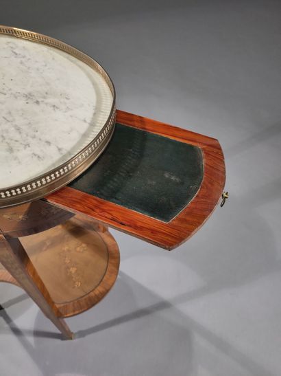 Small oval writing table, in marquetry of...