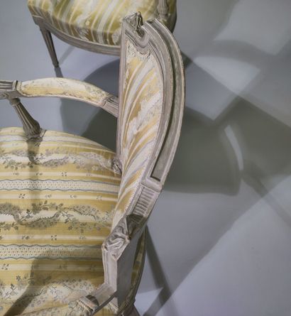 Pair of molded and painted beech armchairs...