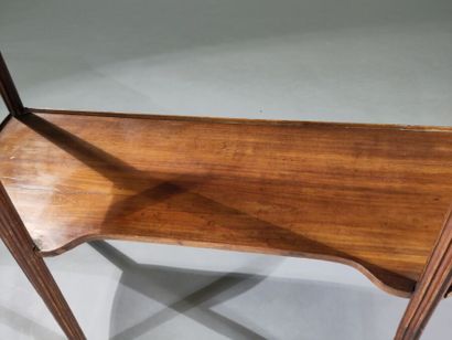 Molded walnut console table opening to a...