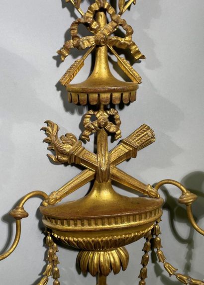 Paire d'appliques en bois doré à deux bras...