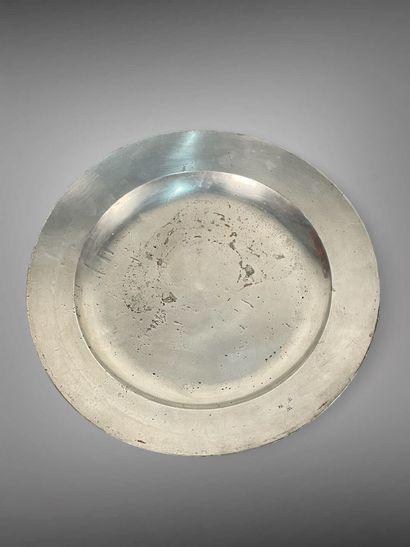 Large circular pewter dish, engraved W W...