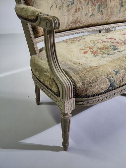 Six armchairs and a sofa in molded, carved...
