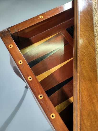 Solid mahogany game table, the scalloped...