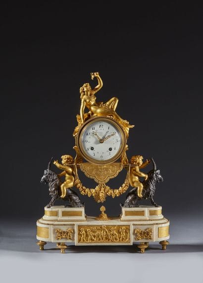 Bacchante clock in patinated bronze, gilt...
