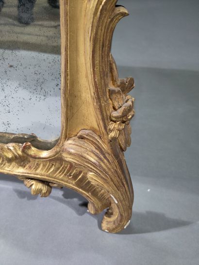 Large molded, carved and gilded wood mirror...