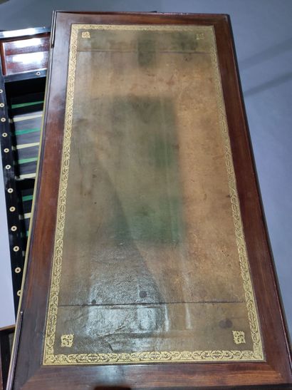 Mahogany and ebony game table, opening with...