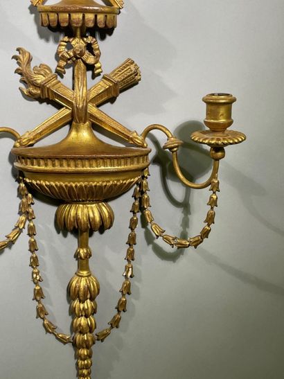 Paire d'appliques en bois doré à deux bras...
