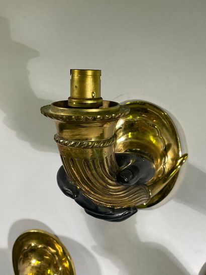 Suite of five one-arm sconces in bronze and...